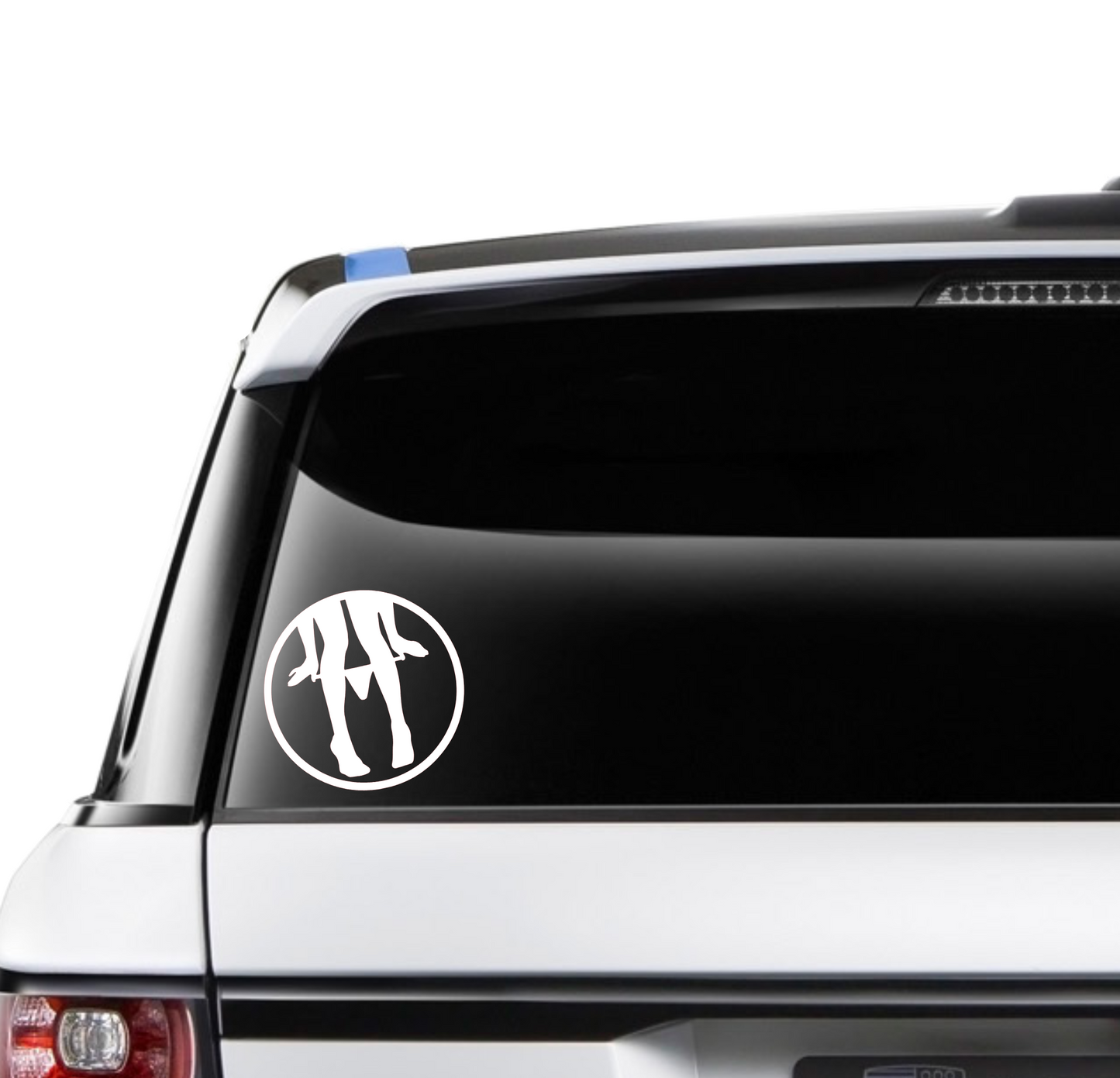 This image displays the "Panty Dropper - Logo" decal on the rear window of a car, showcasing its sleek design and potential application on vehicle surfaces. The logo, depicted in a contrasting color for visibility, is a stylized representation that could appeal to various aesthetic preferences.