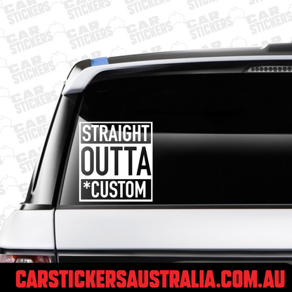 A custom text decal sticker with the phrase 'Straight Outta Custom' applied on the rear window of a car.